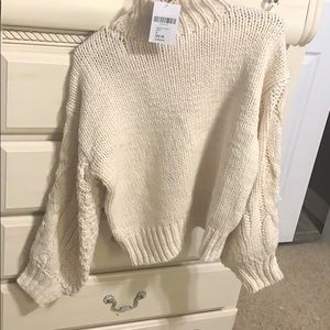 white turtle neck sweater